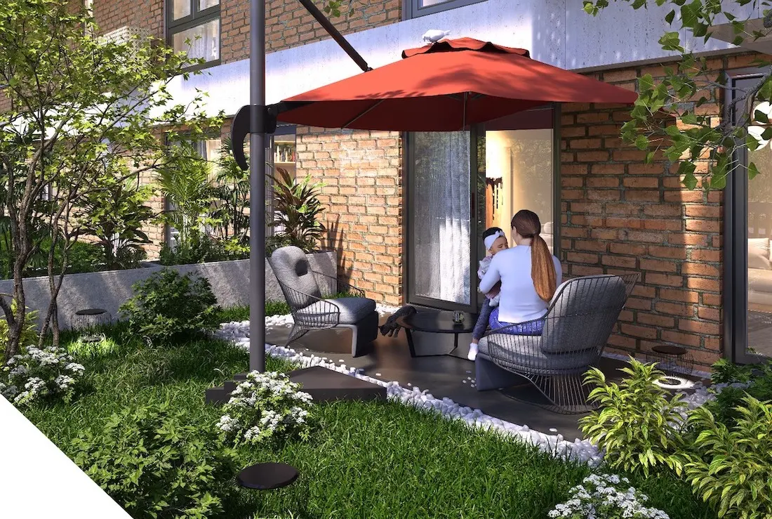 Beautifully landscaped garden area with green spaces and modern walkways in a Sultangazi residential complex, Istanbul.
