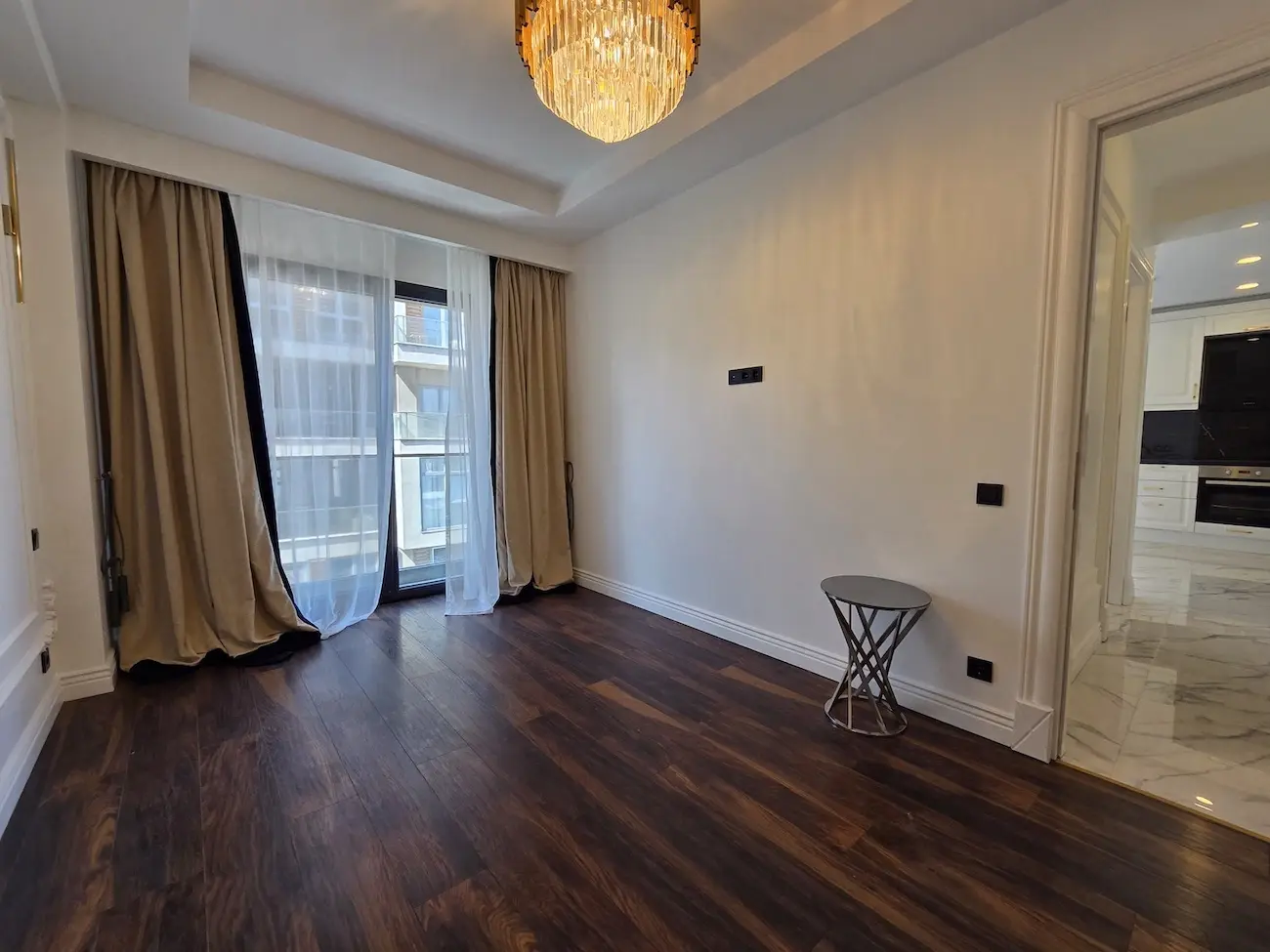 Modern and bright living room interior with contemporary decor in a luxury Kağıthane residence, Istanbul.
