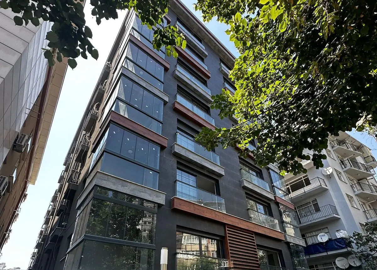 Modern and luxurious architectural facade of a residential building with premium finishes in the Besiktas district, Istanbul.